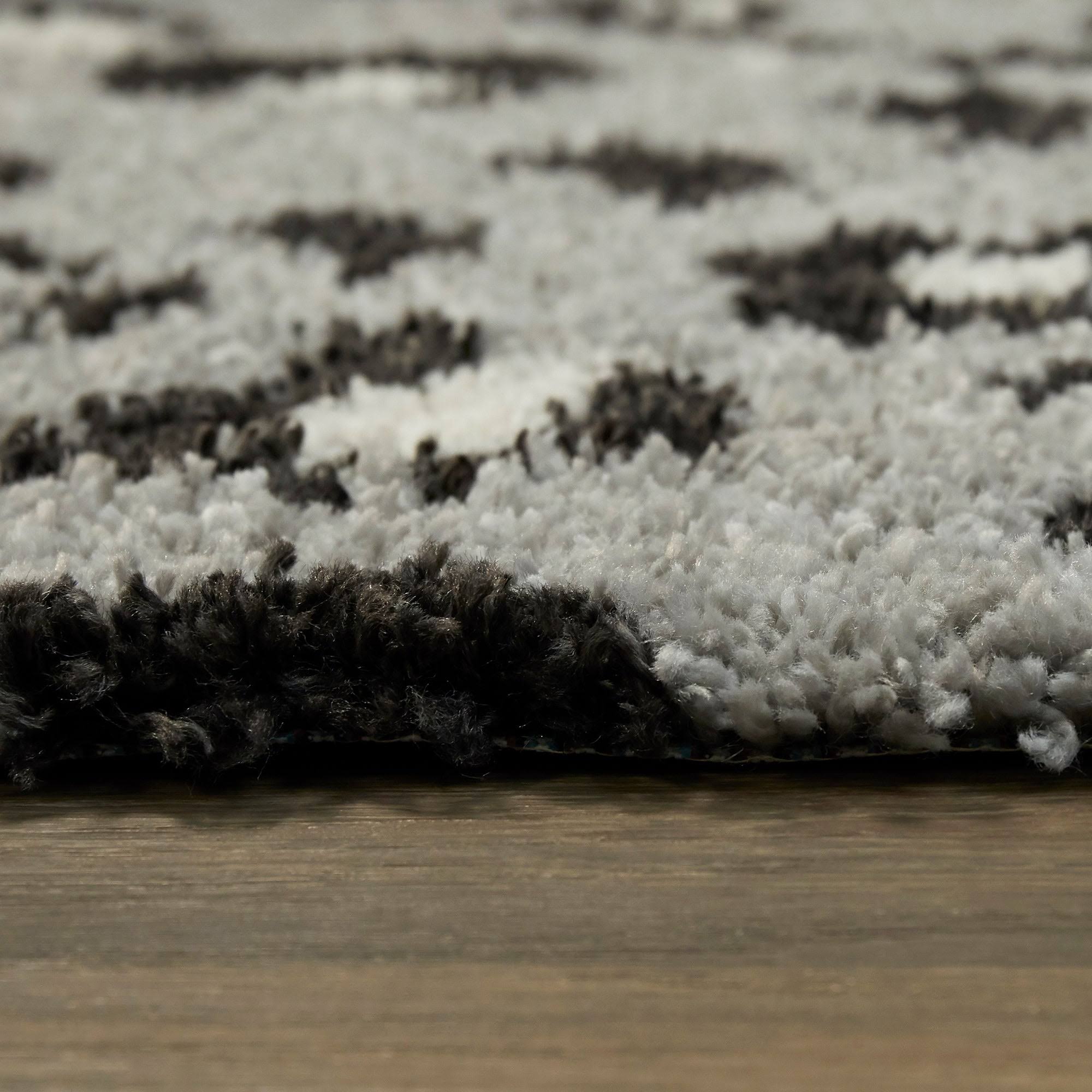 BALTA Asaro Cream 5 ft. x 7 ft. Leopard Print Shag Area Rug, Ivory