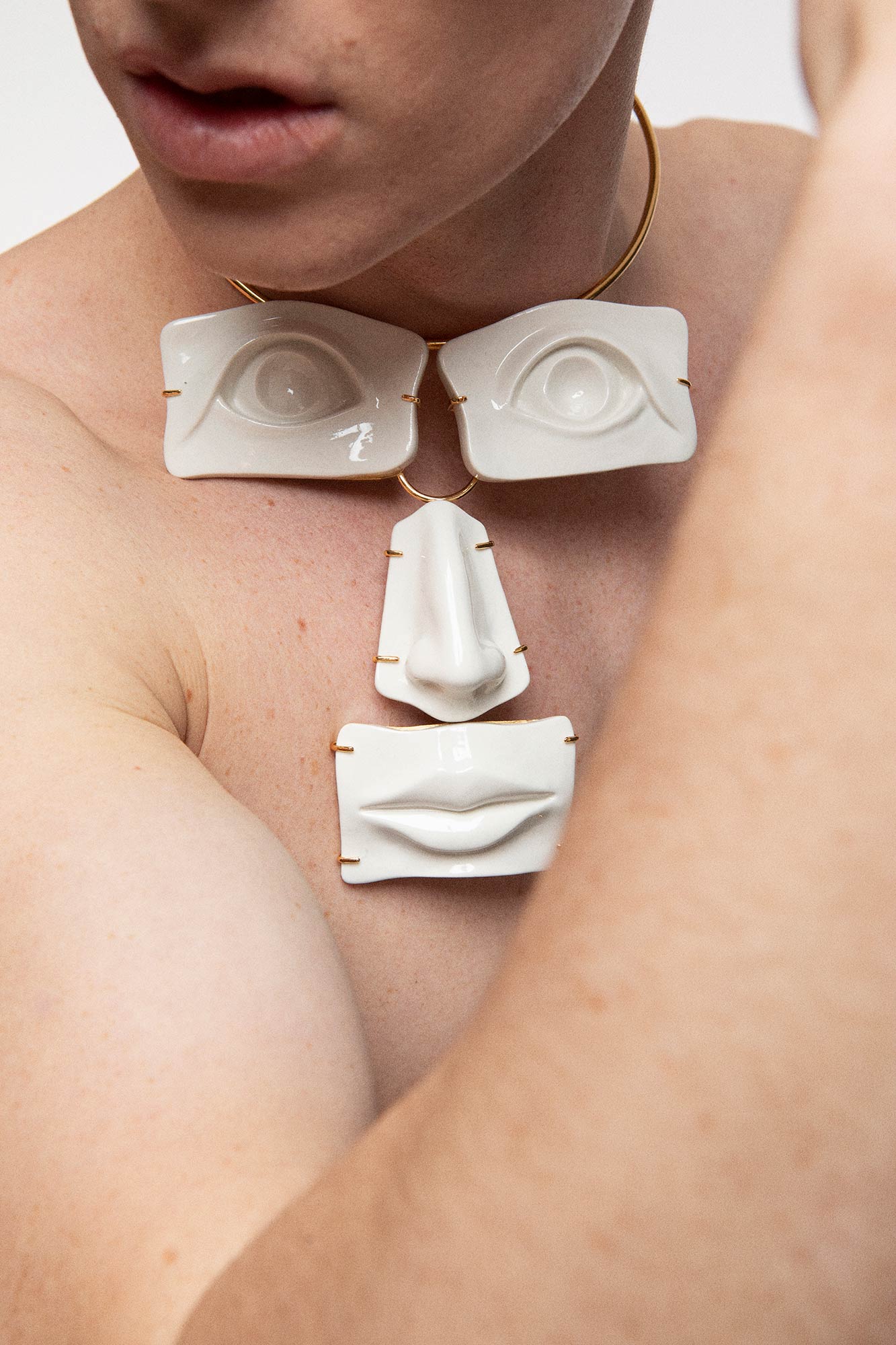 FACE STATEMENT NECKLACE