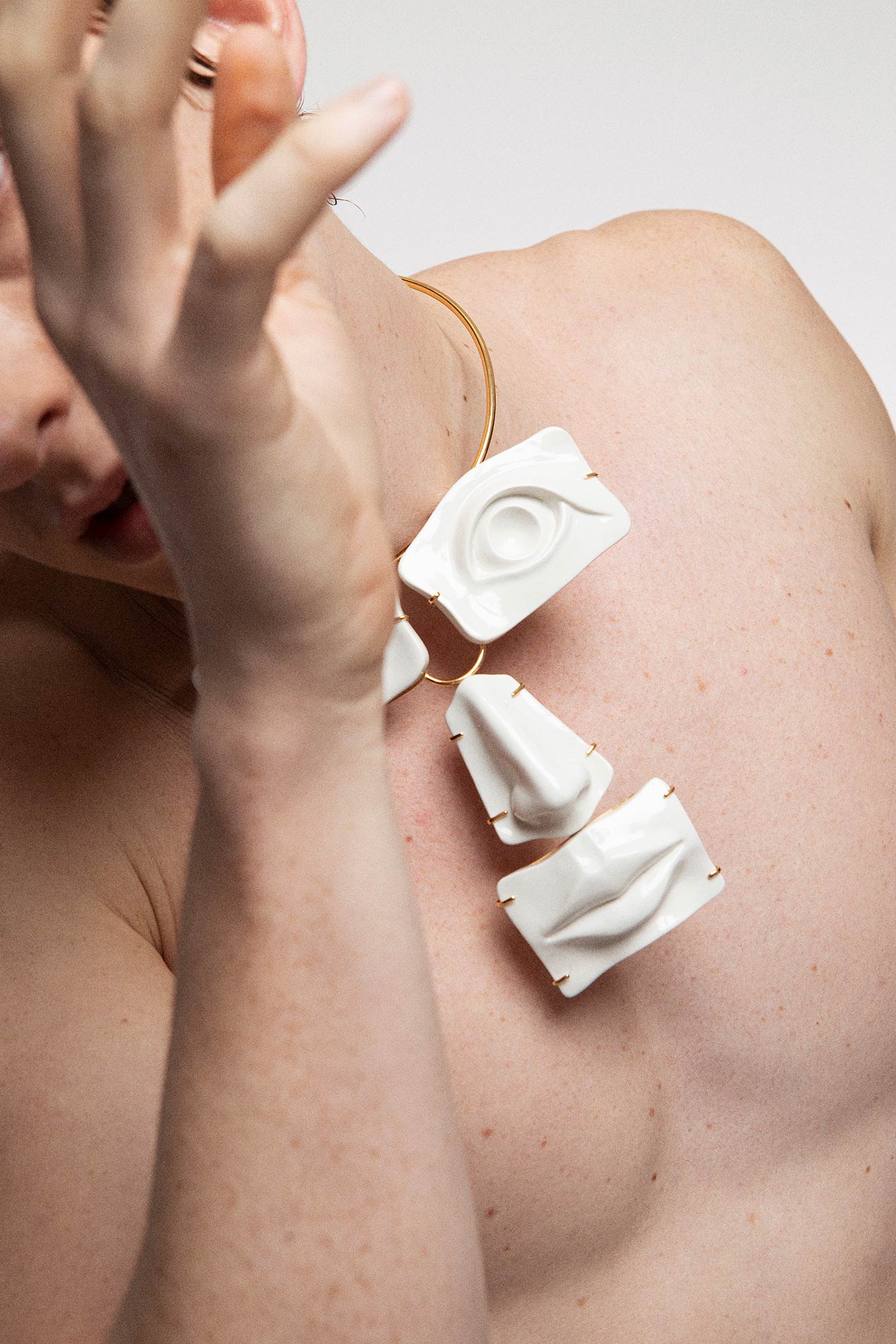 FACE STATEMENT NECKLACE